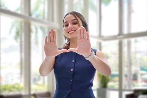 Rebecca Kaiser doing the "U" symbol with her hands